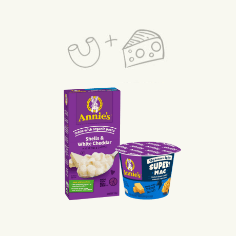 Family shot of Annie's Shells & White Cheddar Macaroni and Cheese and Super Mac.